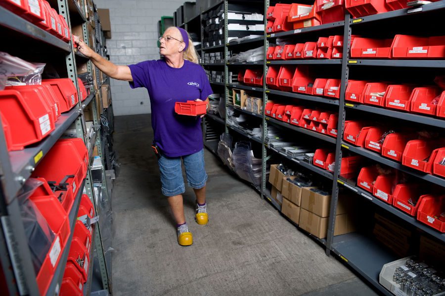 Foodservice-Technology-Marmon-Renew-Parts-Room-900x600 Female worker organizing items in stockroom