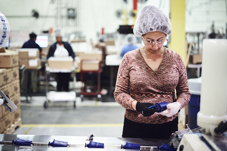 Woman on manufacturing line