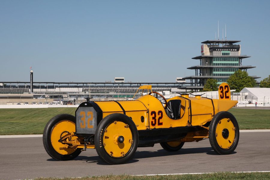 Marmon Wasp replica car parked on race track.