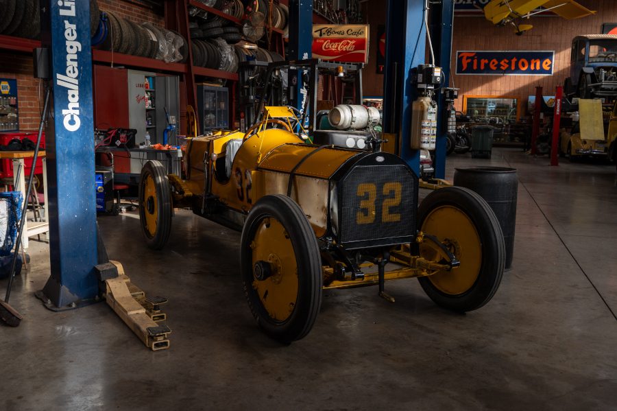 Replica of the winning Wasp car displayed in a shop environment.